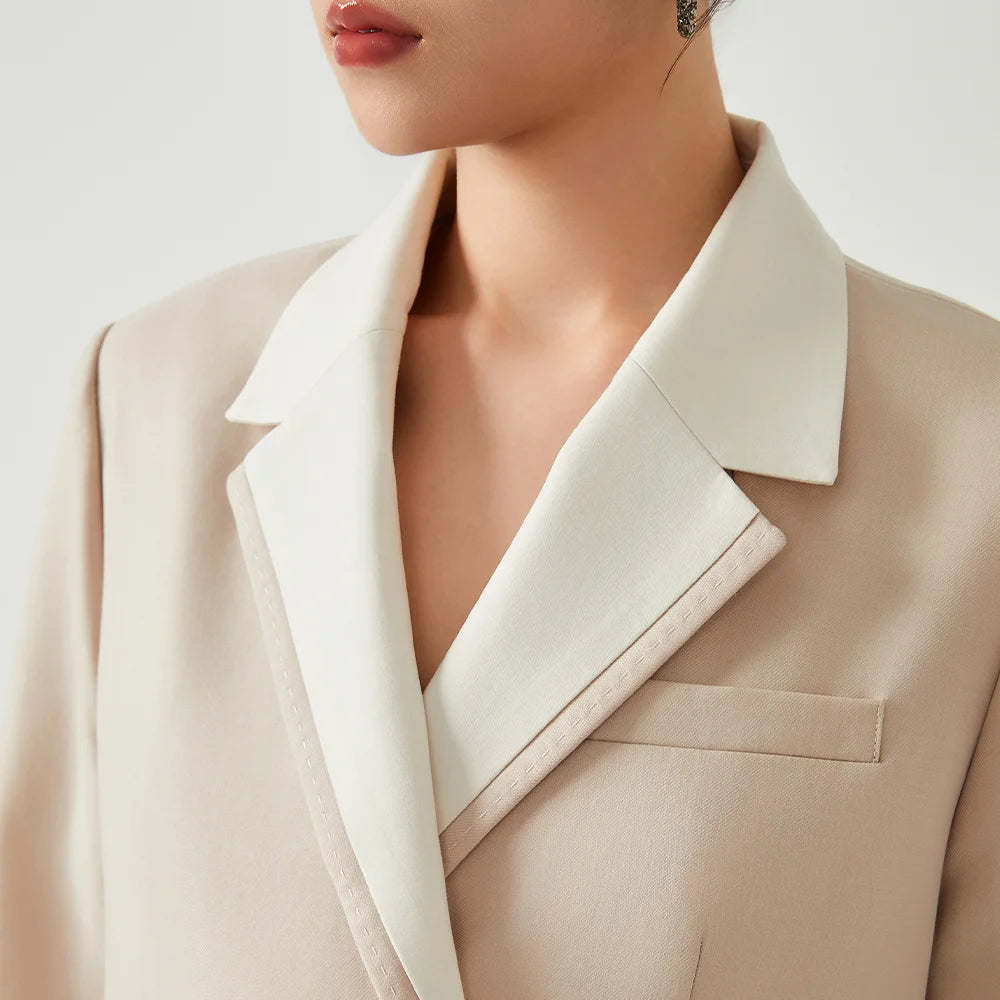 Upper-part close-up of model wearing women’s Silver Pink & Davy Grey blazer in Silver Pink — From Borcelleclothes.