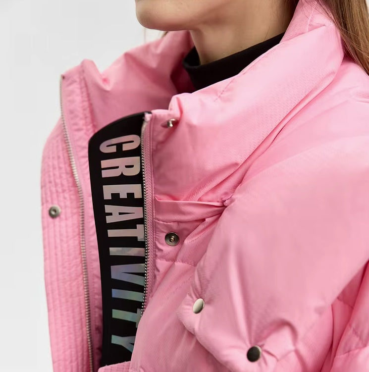 Upper side view of the Cherry Blossom sleek down jacket with creative detail. From Borcelleclothes.