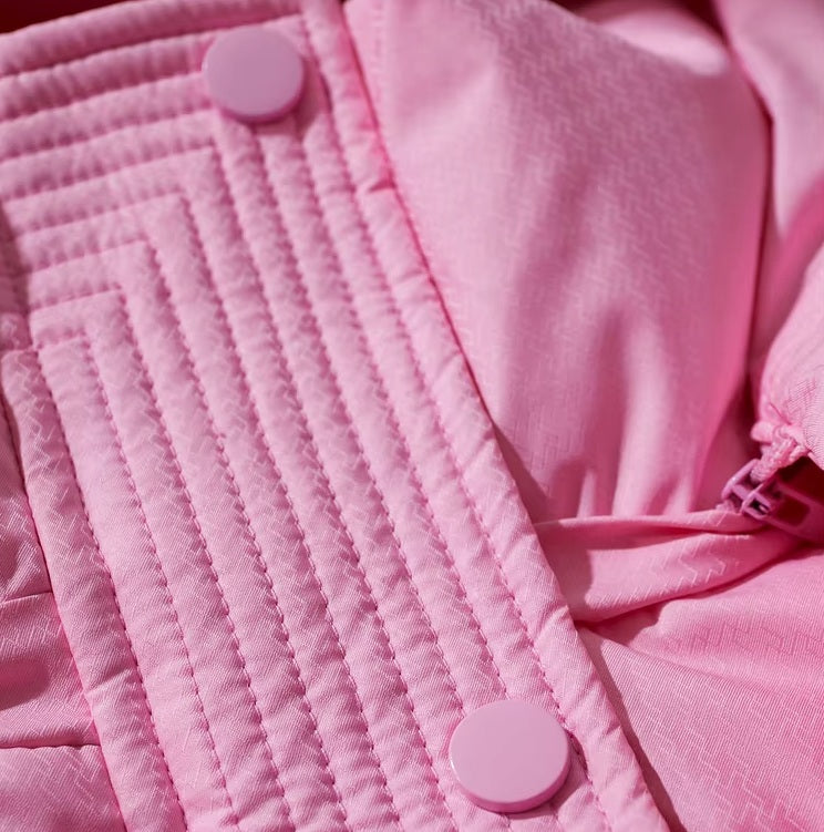 Quilted front placket with snap buttons on the Cherry Blossom sleek down jacket. From Borcelleclothes.