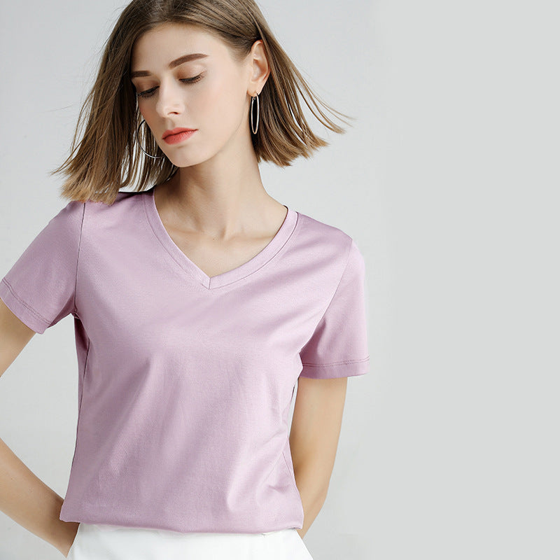 Women's Slim Fit Mercerized Cotton V-Neck T-Shirt in Languid Lavender – Expertly crafted from 100% mercerized cotton, featuring a luxuriously soft and smooth finish. This slim fit T-shirt with a modern V-neck design and sleek, solid pattern is perfect for versatile wear, offering both comfort and a timeless silhouette for any occasion. From Borcelleclothes.