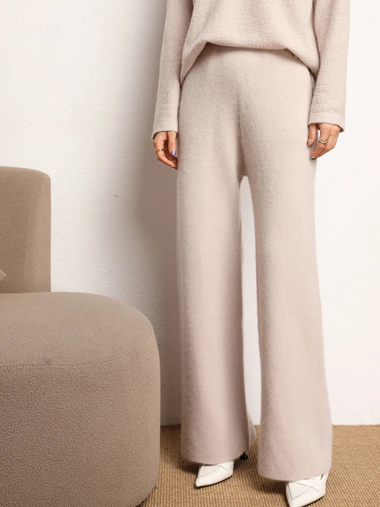 Women's Straight Cut Alashan cashmere trousers in Champagne Pink, featuring a straight cut, front slash pockets, and a ribbed waistband — From Borcelleclothes.