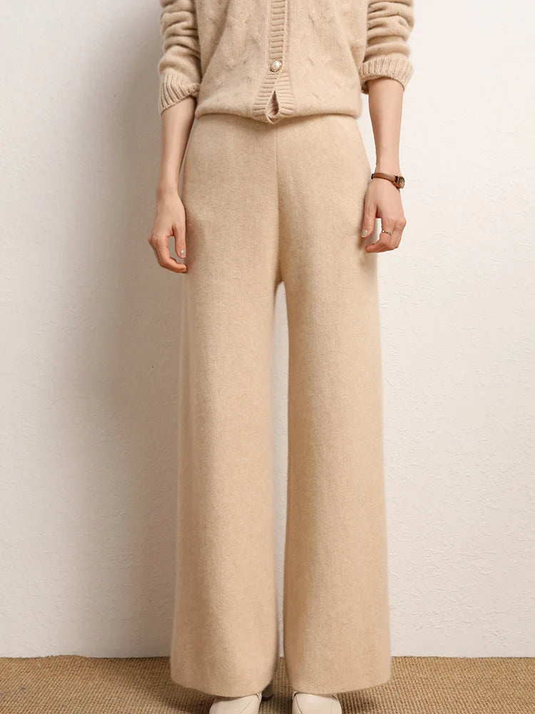 Model standing straight in Desert Sand straight-cut Alashan cashmere trousers — From Borcelleclothes.