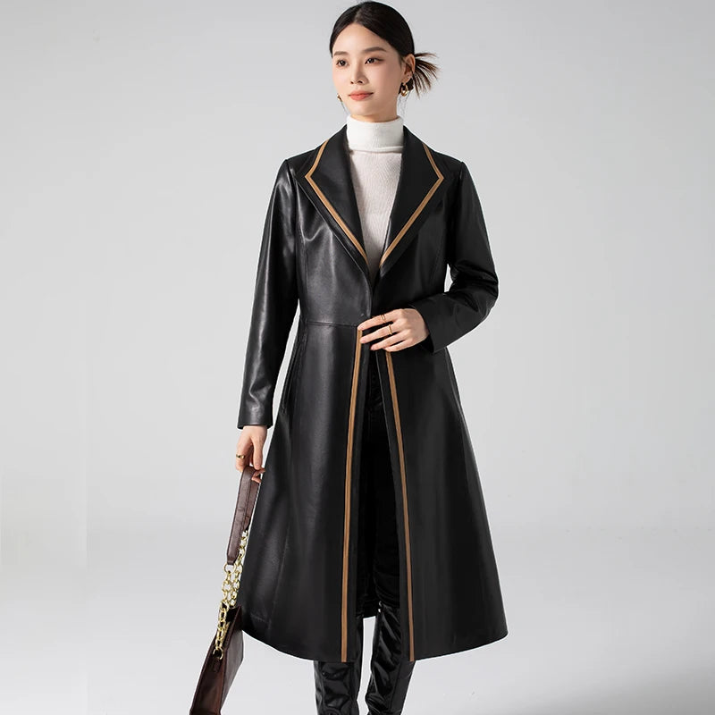 Women's Structured Leather Coat in Onyx with Warm Ochre Trim. Crafted from 100% genuine sheepskin, featuring a single-breasted A-line silhouette, sharp lapel collar, and precision seam detailing. Borcelleclothes.