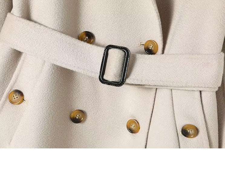 Waist section of the Pearl Bush structured wool coat with visible belt and belt loops. From Borcelleclothes.