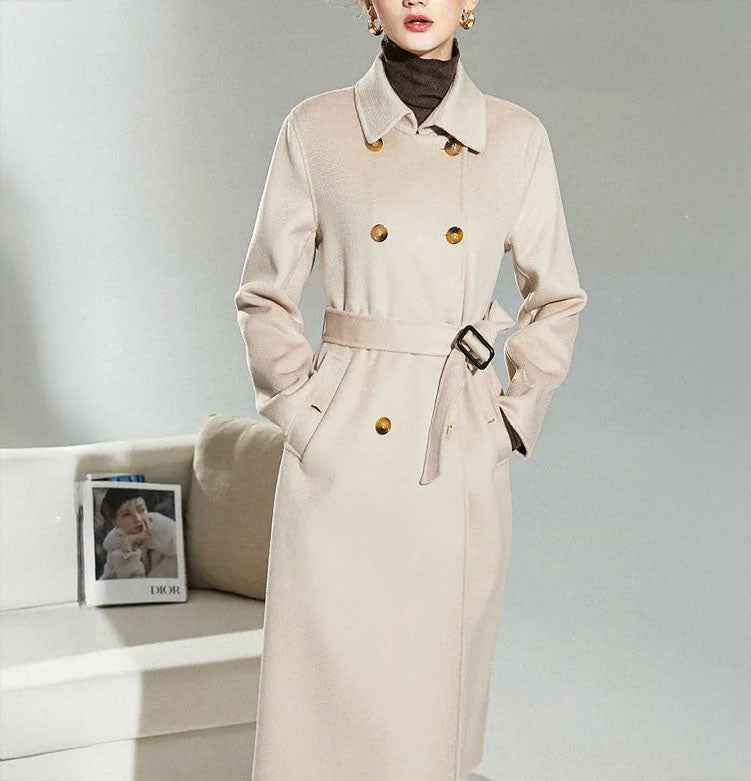 Women's Structured Wool Coat in Pearl Bush—a mid-calf double-breasted silhouette with a pointed collar, adjustable belt, and a softly neutral hue. From Borcelleclothes.