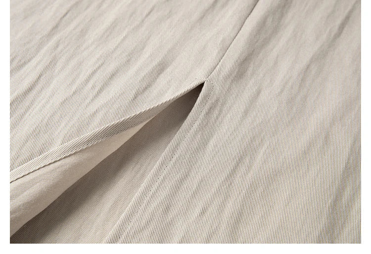 Back view of the dress with vent — ease of movement built into the silhouette. From Borcelleclothes.