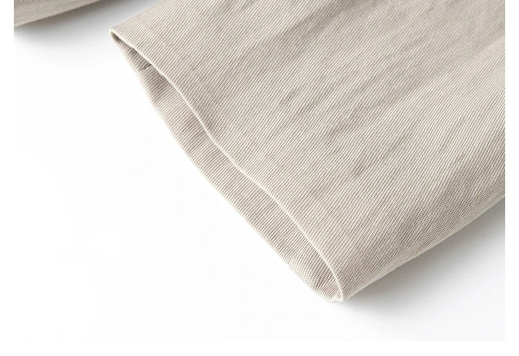 Detail of set-in sleeve with single-button cuff — clean finishing on Swiss Coffee jacket. From Borcelleclothes.