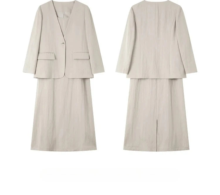 Front and back view of jacket and dress — a calm two-piece silhouette in soft neutral tones. From Borcelleclothes.
