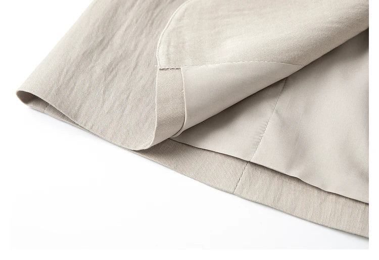Unfolded bottom hem of jacket — softly structured with precise stitching. From Borcelleclothes.