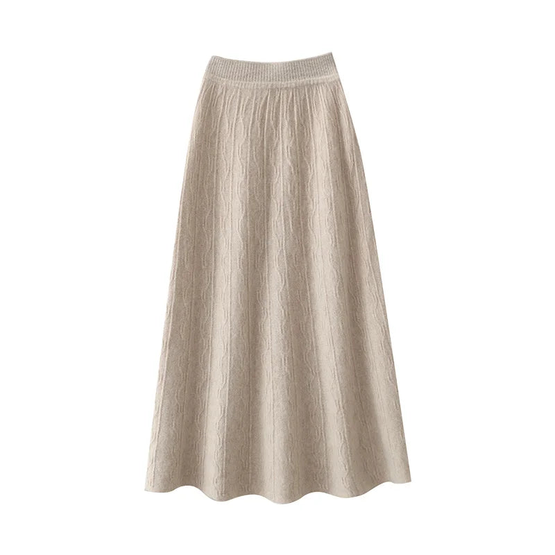 Pale Silver textured merino skirt, close-up of natural draping and knit fluidity in A-line shape — From Borcelleclothes.