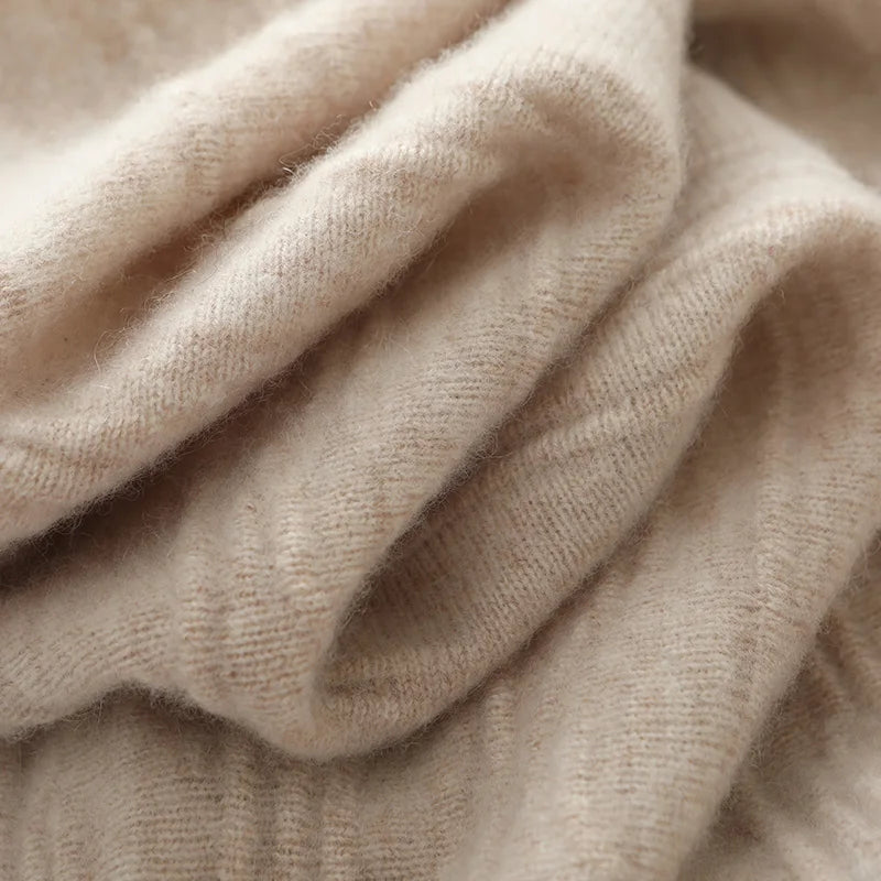 Pale Silver textured merino skirt, wave-folded to demonstrate soft knit structure and alternating raised patterns — From Borcelleclothes.