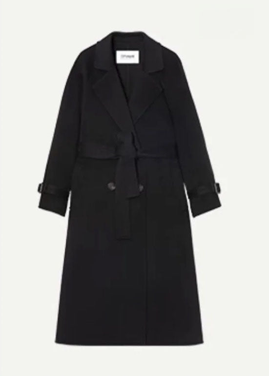 Women's Tibetan Cashmere Coat in Onyx, crafted from 100% double-sided Tibetan cashmere, featuring notched lapels, raglan sleeves, adjustable sleeve belts, a waist belt, and diagonally exposed single-welt pockets for a refined and luxurious look. From Borcelleclothes.