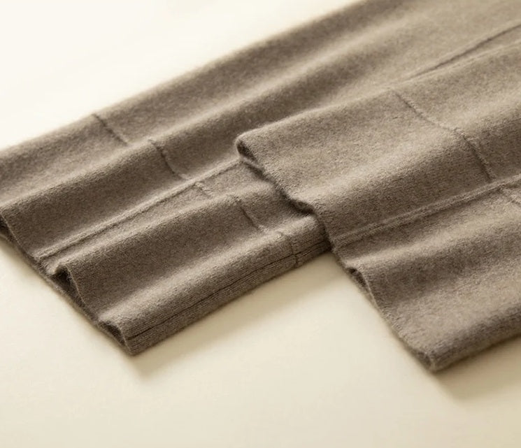 Bottom hems of Traced Seaming Cashmere Trousers in Almond Frost — From Borcelleclothes.