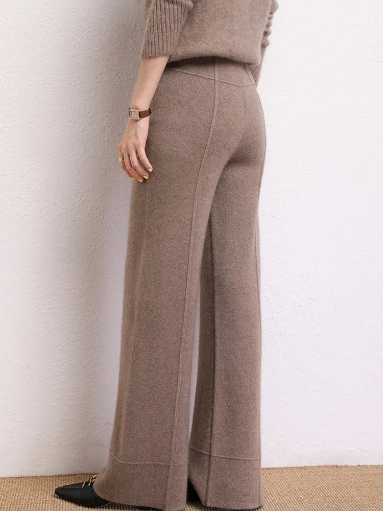 Back view of Traced Seaming Cashmere Trousers in Almond Frost — From Borcelleclothes.