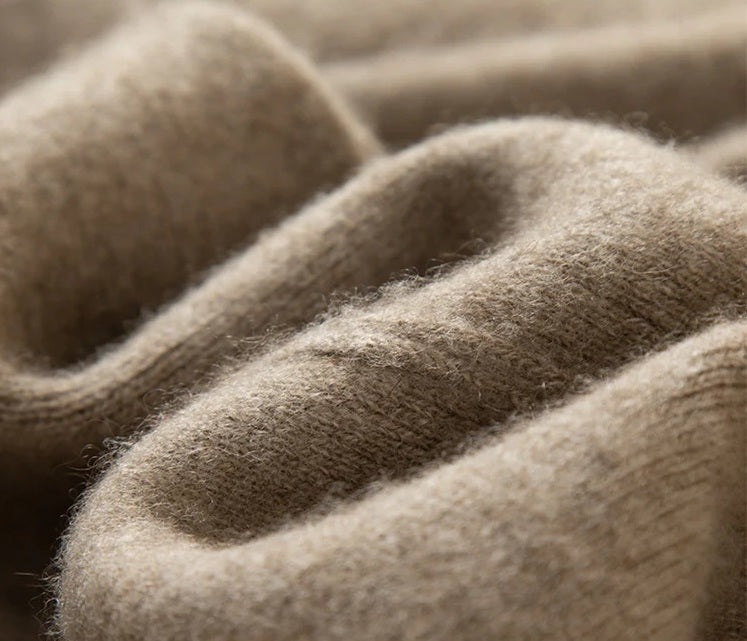 Wave-folded texture detail of Traced Seaming Cashmere Trousers in Almond Frost — From Borcelleclothes.