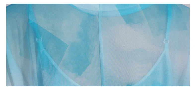 Back shoulder section of the Glacier ensemble, focusing on the transparency of the fabric. From Borcelleclothes.