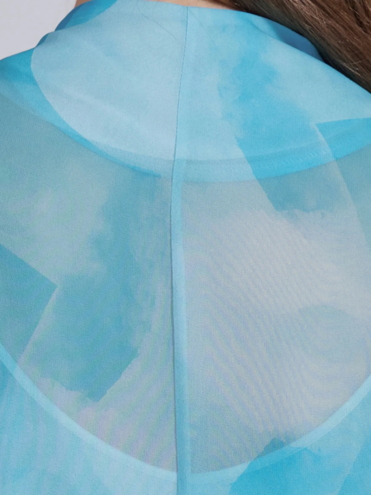 Back upper part of Glacier silk ensemble, highlighting the high collar and soft layering of chiffon over the camisole. From Borcelleclothes.