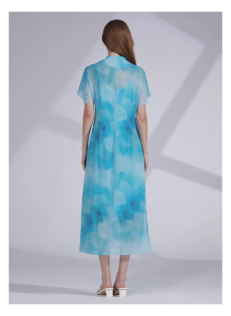 Back view of the Glacier silk ensemble, revealing the long chiffon drape and structured camisole beneath. From Borcelleclothes.