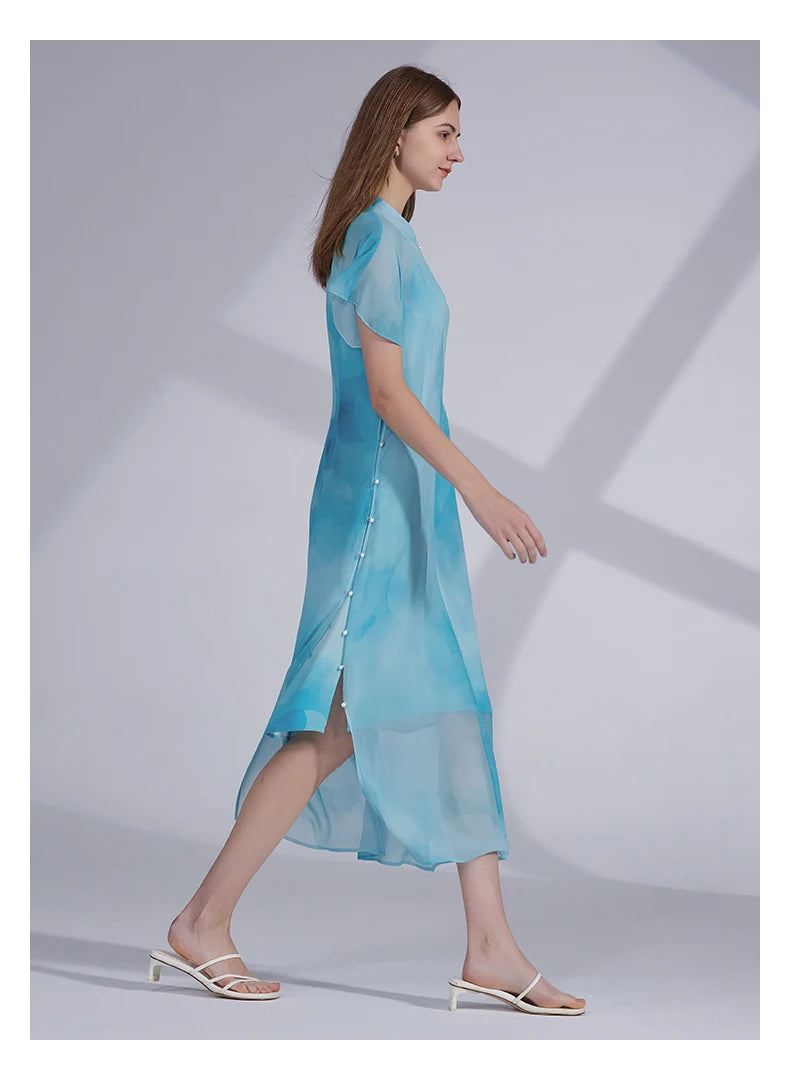 Side view of the Glacier silk ensemble, emphasizing the airy chiffon outer layer and subtle silhouette. From Borcelleclothes.