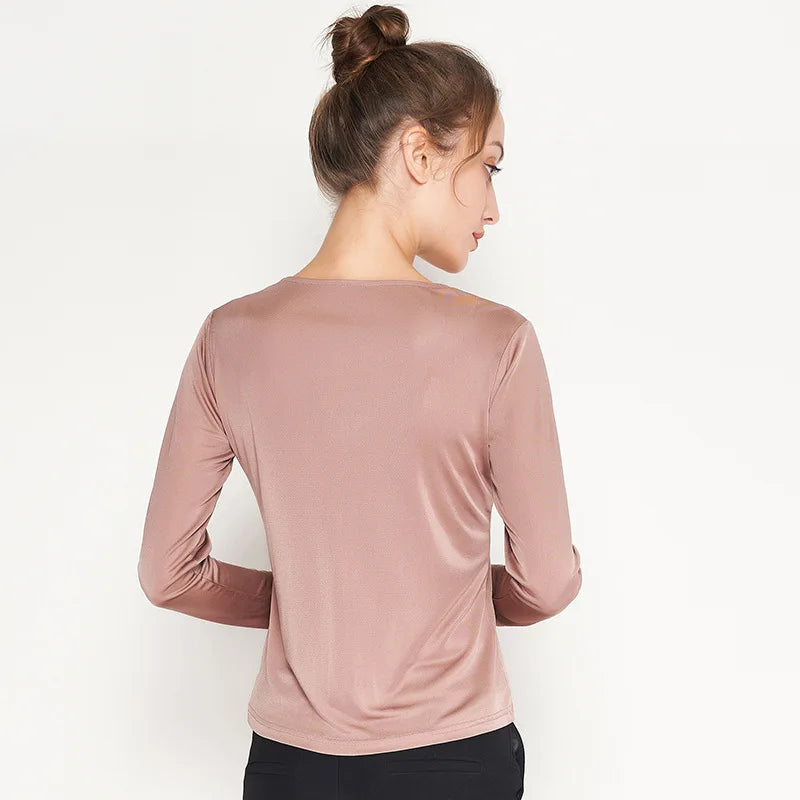 Women's Vintage-Inspired Silk Top in Rose Fog, a back of a model. From Borcelleclothes.
