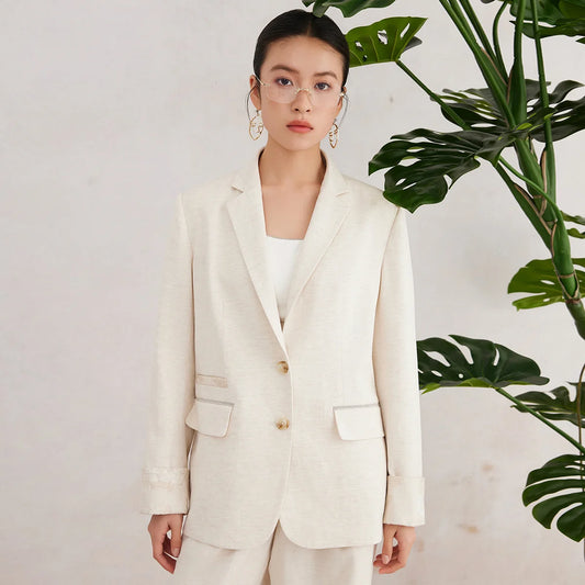Women’s White Coffee blazer with straight silhouette, jacquard-covered cuffs, and asymmetrical pocket detail — a textured design shaped by natural fibers and quiet complexity. From Borcelleclothes.