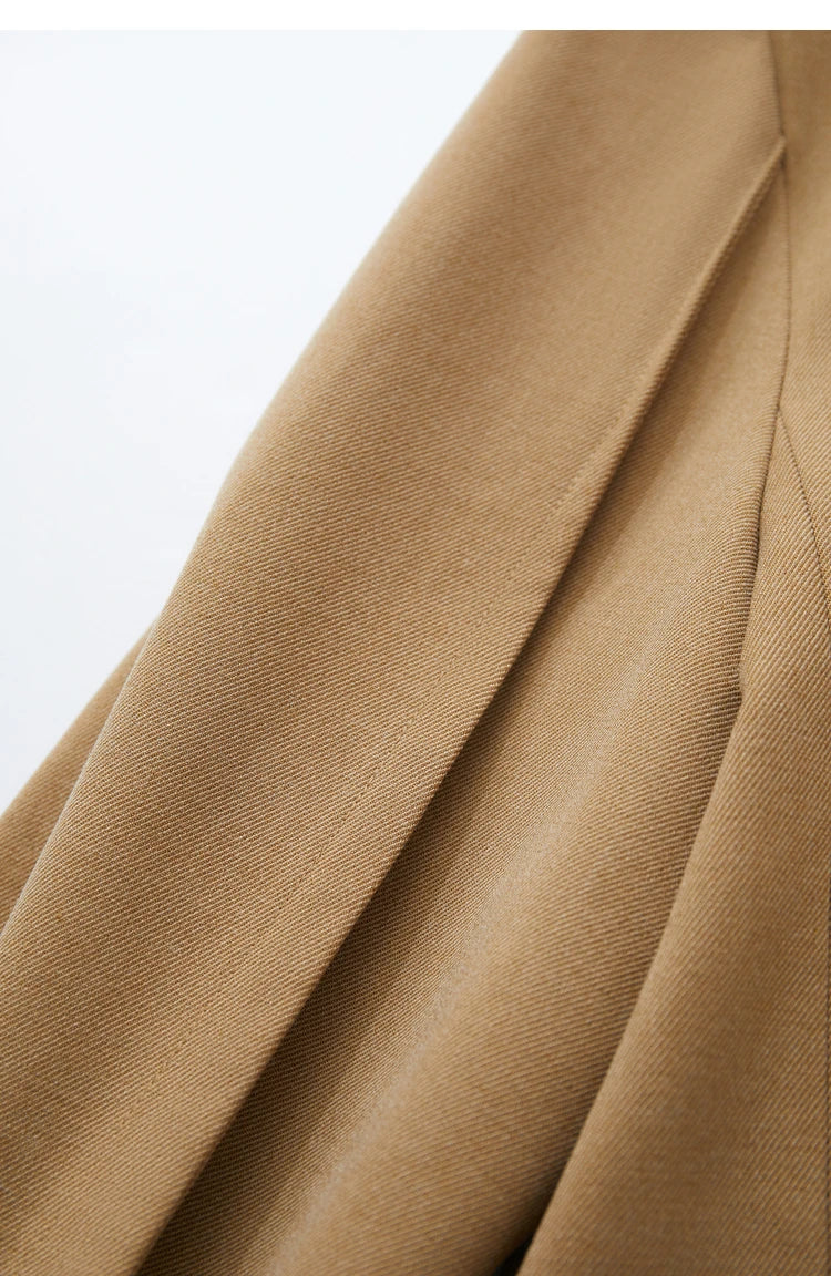 Upper back detail of the Women’s Wire Knot Detail Blazer in French Beige showing sleeve dart. From Borcelleclothes.