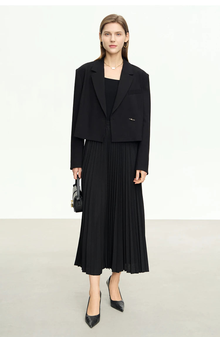 Women’s Wire Knot Detail Blazer in Onyx, model posing with foot slightly forward. From Borcelleclothes.