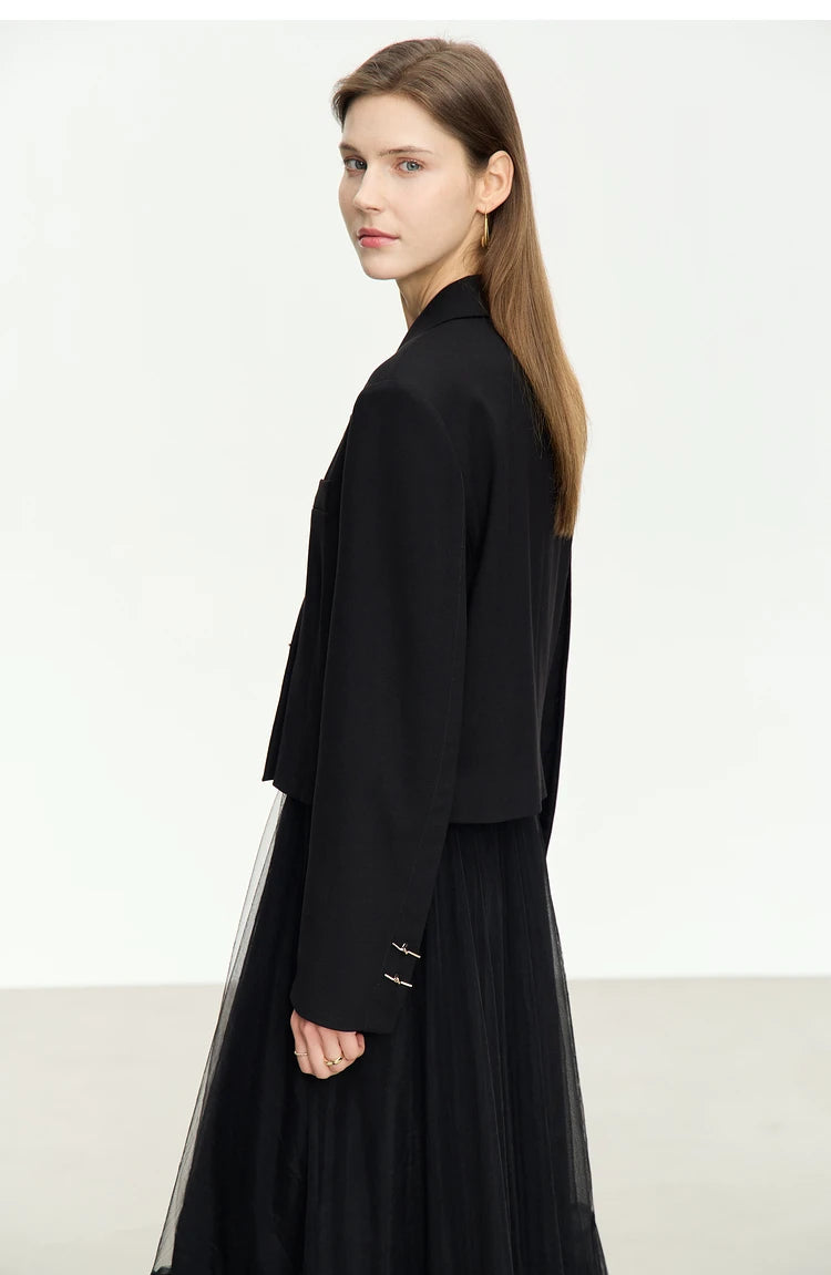 Women’s Wire Knot Detail Blazer in Onyx, model turned with head to the side. From Borcelleclothes.