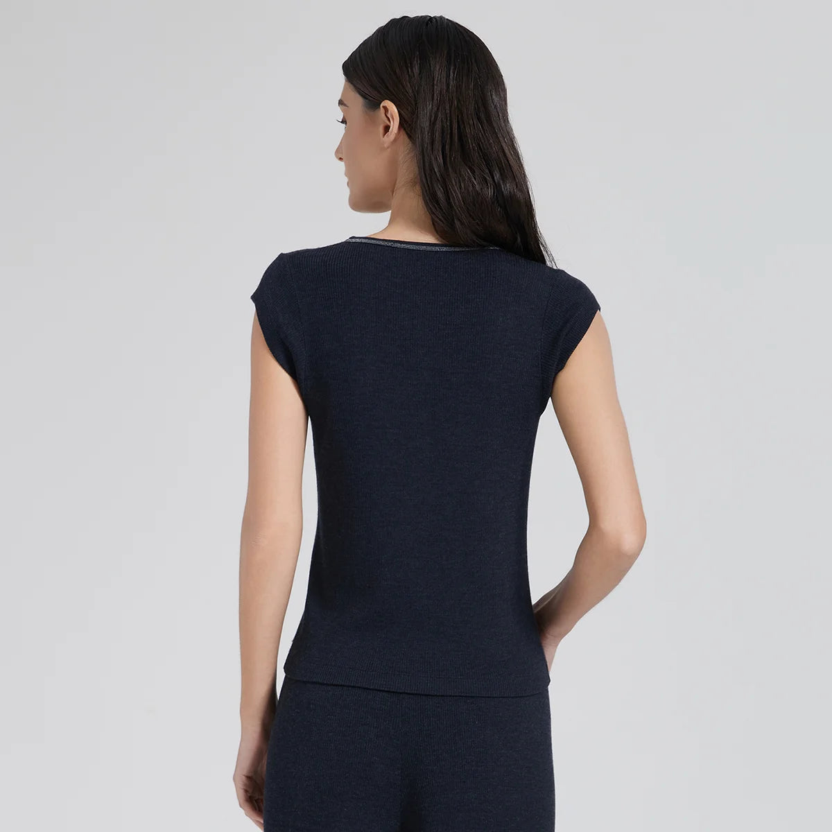 Back view of the women's wool-silk top in Black Pearl, showing the smooth knit and cap sleeve design. From Borcelleclothes.
