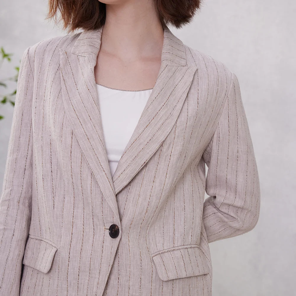 Midsection view of Pink Swan women’s woven stripes linen blazer with twisted-yarn striped weave. From Borcelleclothes.