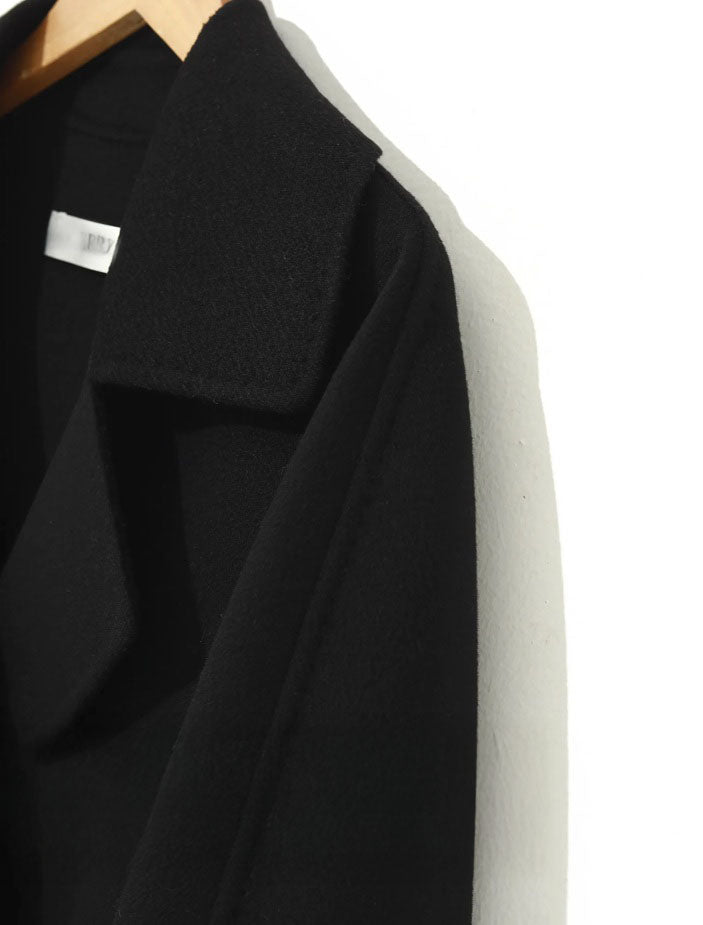 Upper left section detail of a Women's Wrap Cashmere coat in Onyx. From Borcelleclothes.
