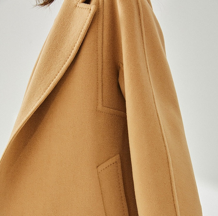 The square gusset on the Women's Wrap Coat Redefined in Brown Sugar, showcasing its architectural precision and structured design. From Borcelleclothes.