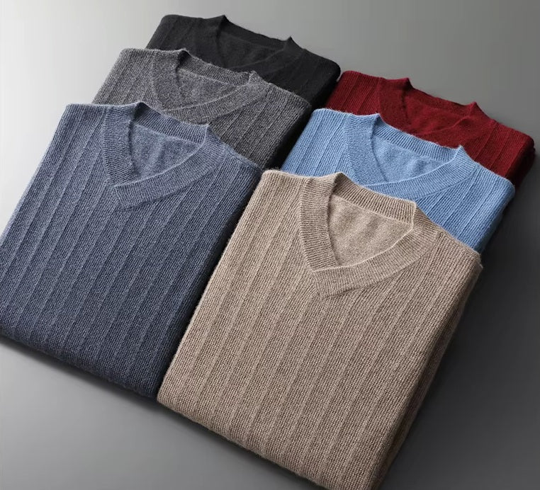 Folded Men's Cashmere V-Neck Sweaters in six elegant color options: Sandrift, Wine, Davy Grey, Kashmir Blue, River Bed, and Onyx. From Borcelleclothes.