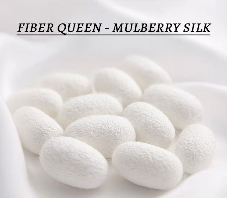 White Mulberry silk cocoons — the natural origin of the satin used in the women’s silk set, crafted for softness, breathability, and quiet elegance. From Borcelleclothes.