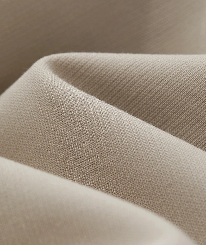 Close-up of folded fabric in Silk color showing the textured weave and soft drape. From Borcelleclothes.