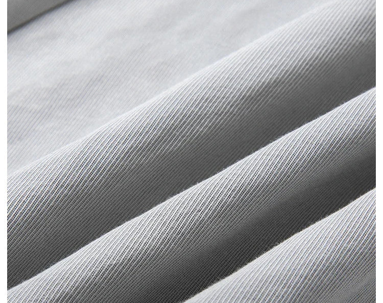 Folded wave texture of French Grey twill fabric, revealing its denim-like weave. From Borcelleclothes.
