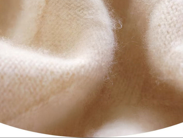 Demo of the Men's Dimensional Abstract Sprouts Wool Sweater in Almond, highlighting its pure wool composition and refined abstract design. From Borcelleclothes.