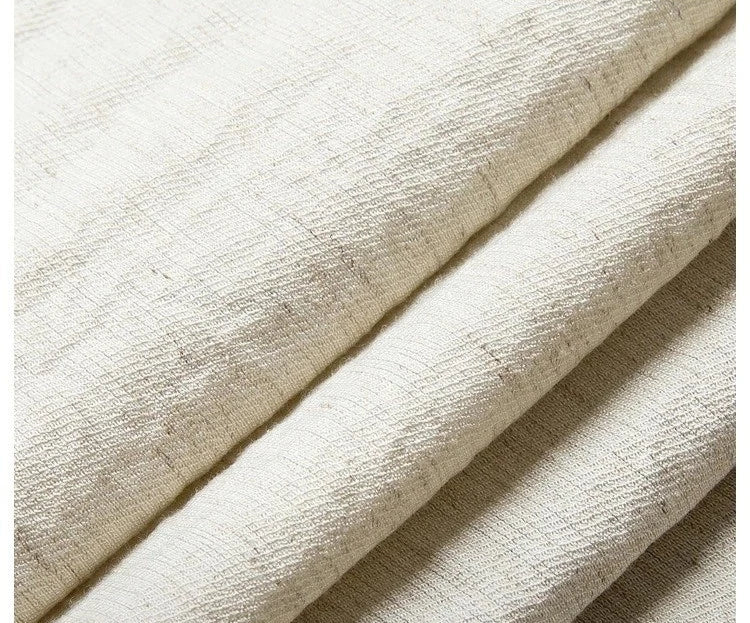Crinkled fabric of the Wild Sand set in a wave-folded display, highlighting texture. From Borcelleclothes.