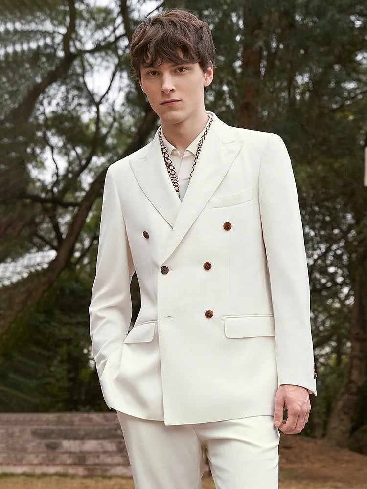 Model in the Men's Alabaster Merino Wool Suit standing straight, highlighting the elegant double-breasted blazer and tailored pants. From Borcelleclothes.