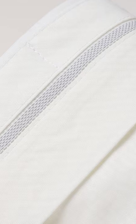 The Men's Alabaster Merino Wool Suit's pants waistband with gripper tape, designed to keep shirts neatly tucked. From Borcelleclothes.