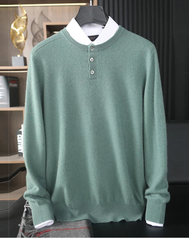 Fluid draping of a Men’s Grade A Cashmere Sweater in Opal, with placket detail and textured shoulder panels, regula fit, shown layered with shirt — From Borcelleclothes.
