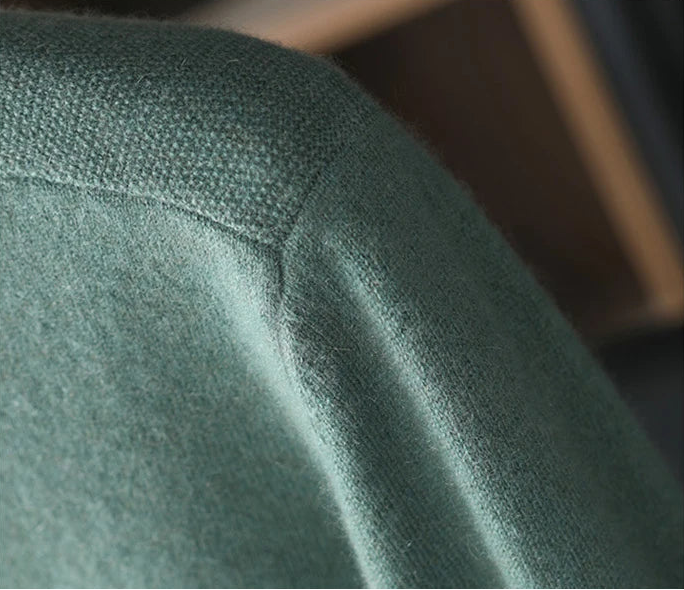 Men’s cashmere sweater in Opal, close-up of a textured shoulder panel — From Borcelleclothes.