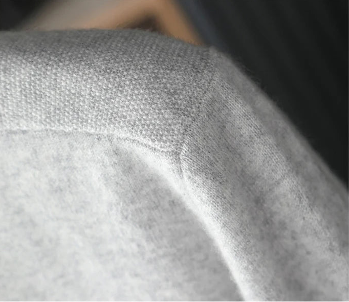 Men’s Button Placket Cashmere Sweater in Silver Sand, macro shot of a textured shoulder panel — From Borcelleclothes.