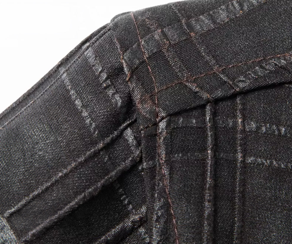 Detail shot highlighting the precise shoulder seam construction and geometric pattern alignment on a dark checkered silk shirt — From Borcelleclothes.