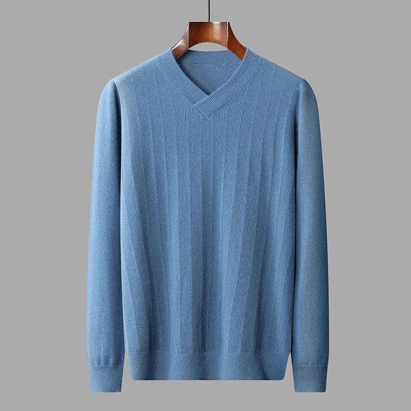 Men's  Crossover V-Neck Cashmere Sweater in Kashmir Blue, crafted from 100% pure cashmere, featuring a wide wrapped hem, and a unique textured front in airy looped stitches. From Borcelleclothes.