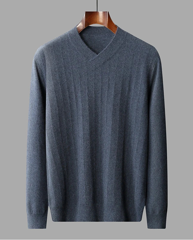 Draping of a Men's  Crossover V-Neck Cashmere Sweater in River Bed, crafted from 100% pure cashmere, featuring a wide wrapped hem, and a unique textured front in airy looped stitches. From Borcelleclothes.
