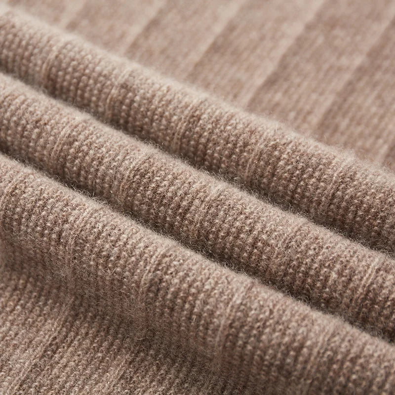 Wave-folded texture of the Men's Crossover V-Neck Cashmere Sweater in Sandrift, highlighting the soft cashmere fabric and intricate striped design. From Borcelleclothes.