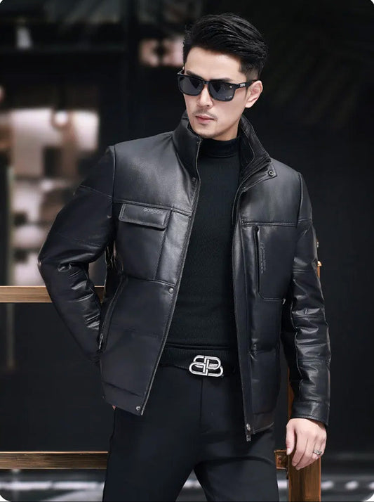 Model wearing unzipped embossed cowhide down jacket in Onyx, hand behind back — From Borcelleclothes.