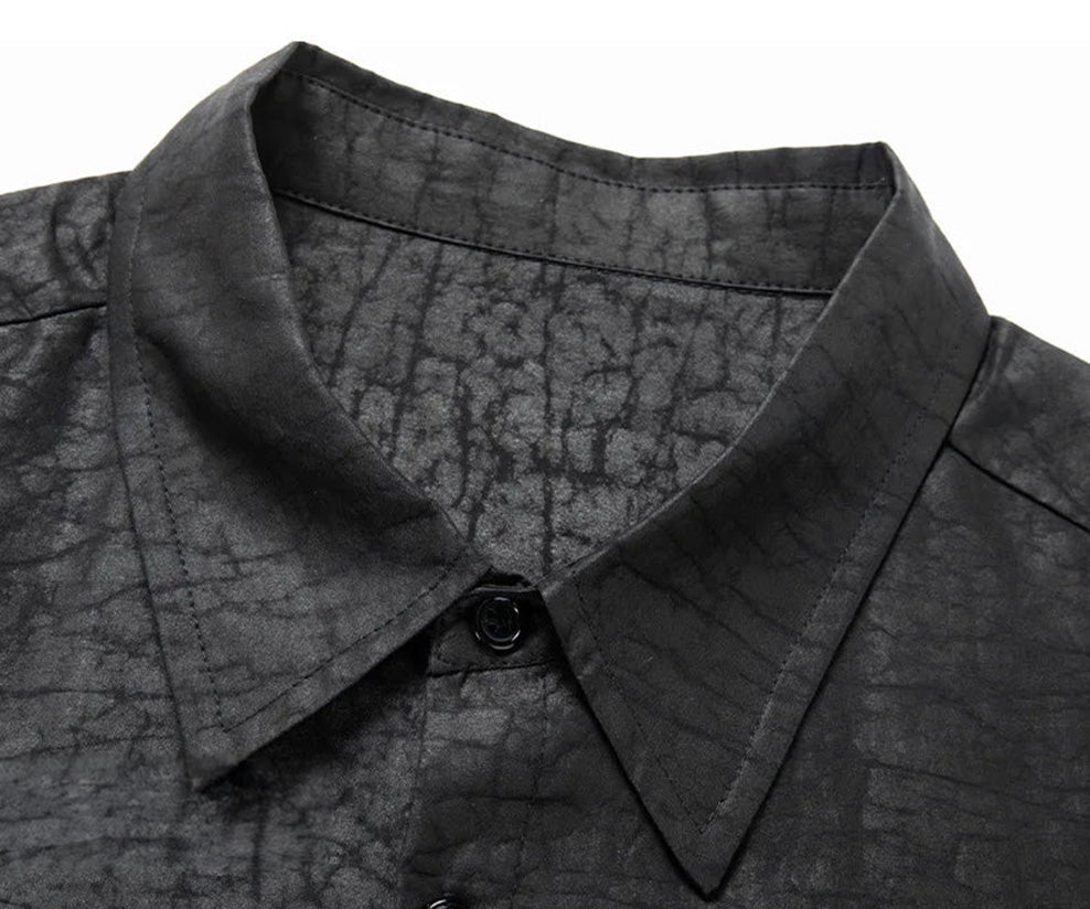 Crisp close-up of the structured pointed collar of the Men's Gambiered Guangdong Silk Shirt, framing the neck with absolute precision against the dark, unrepeatable weave — From Borcelleclothes.