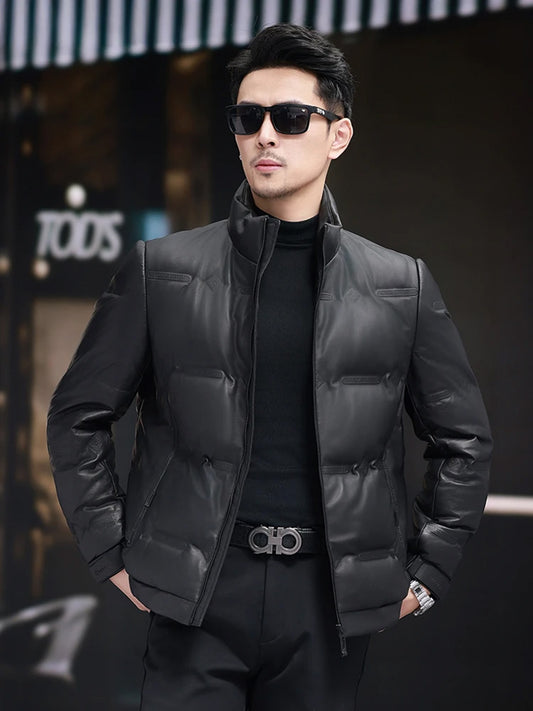 Men’s sheepskin leather jacket in Onyx with an embossed geometric pattern of ovals and rhombuses, featuring a high stand collar, angular princess seams, seam-integrated snap pockets — From Borcelleclothes.